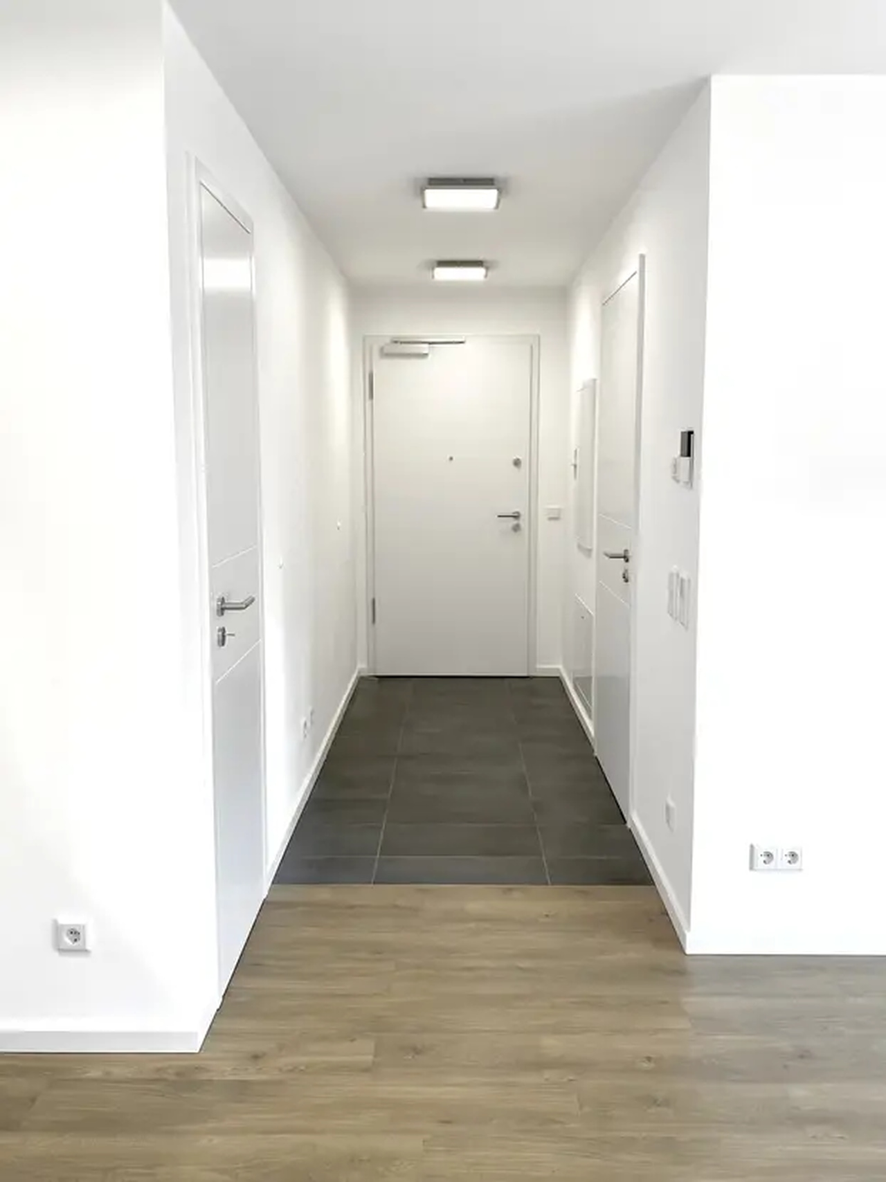 Exklusive 2-Zimmer-Wohnung im EG in Ausrichtung zur Gartenseite mit zwei Terrassen (Süd u. Ost)